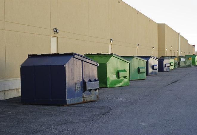 metal waste containers sit at a busy construction site in Auberry, CA